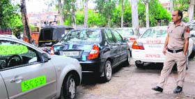 Cars impounded by the police parked at the Sector 26 police station.