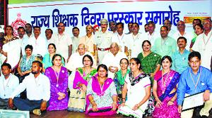Governor Kaptan Singh Solanki and CM Bhupinder Singh Hooda with feted teachers in Chandigarh on Friday. 