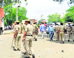 police guard the spot of the protest in Palwal on Friday