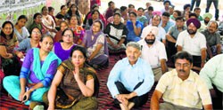 Government college teachers stage a protest on Teachers Day in front of DAV College in Jalandhar on Friday. A Tribune Photograph