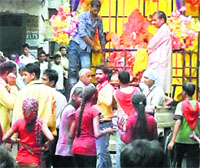 Devotees take part in a 'shobha yatra' during the Ganesh Utsav celebrations at Mandi Ahmedgarh. A Tribune photograph