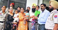 Staff of the Lord Mahavir Civil Hospital, Ludhiana, and members of the Ann Jal Sewa Trust hand over the children to officer-bearers of a foundation. Photo: Inderjeet verma