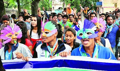 Students canvass for the upcoming student union elections at DAV PG College in Dehradun on Friday. 