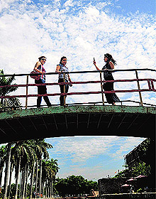 Girls enjoy themselves in the pleasant weather at Panjab University, Chandigarh, on Saturday