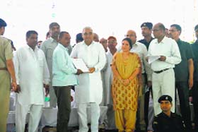 Chief Minister Bhupinder Singh Hooda with Education Minister Geeta Bhukkal in Jind on Saturday