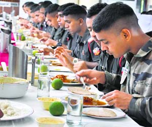 A team of nutritionists, a catering officer and chefs decide on the daily menu so that a cadet gets at least 2,800 calories per day