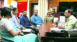 A team from the Bangalore police meets DGP BS Sidhu in Dehradun on Saturday