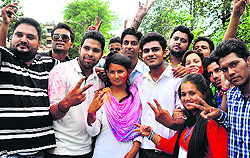 NSUI candidate Suchitra (left) after winning the secretarys post in students union elections at SGRR PG College in Dehradun on Saturday