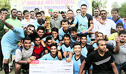 The Citi Young team with the winning trophy at Ambedkar Football Stadium in Dehradun on Saturday