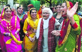 Bringing smile on their faces: Students of Gian Sagar Medical College and Hospital shake a leg with a senior citizen on Grandparents Day at an old-age home in Sector 15, Chandigarh, on Sunday
