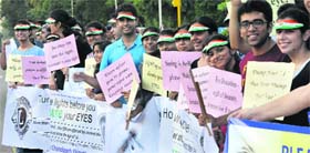 Residents take part in an awareness walk in Chandigarh on Sunday