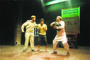 Artistes perform in a play Dus Din Ka Anshan at the Gaiety Theatre in Shimla on Sunday. 