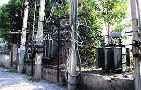 A power transformer installed on the footpath poses a risk of electrocution to the passers-by