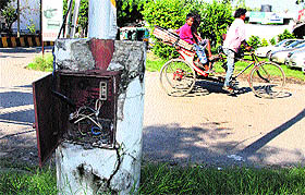 dangling wires of a street light in Puda Complex in Jalandhar.