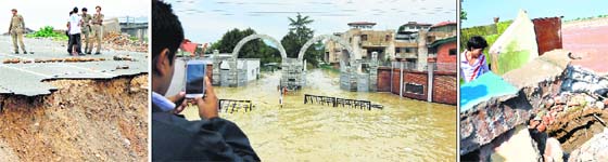 A road which was washed away due to floods in Jammu on Sunday. Tribune photo: Inderjeet Singh; A man takes a picture of a flooded Jammu and Kashmir High Court complex in Srinagar on Sunday. PTI; A damaged house on the bank of the Tawi river in Jammu on Sunday. Tribune photo: Inderjeet Singh