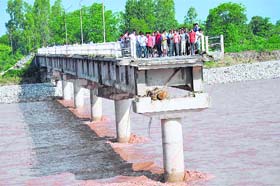 Water wrath: A bridge washed away by floodwater in the Jammu region on Sunday
