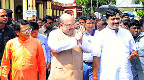 BJP chief Amit Shah with West Bengal BJP president Rahul Sinha at Dakshineswar Kali Temple in Kolkata on Sunday. 