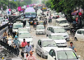 Bumper-to-bumper traffic was witnessed on the waterlogged GT Road after sudden rain in Bathinda on Monday