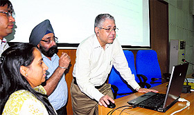 PU Vice-Chancellor AK Grover launches a website at Panjab University in Chandigarh on Monday.