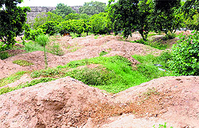 Soil excavated from the construction site of the upcoming multi-level parking at Sector 17 dumped at another part of the sector in Chandigarh.