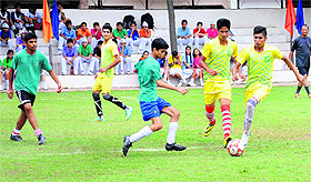Players vie for the ball during a football match at St Xaviers School, Sector 44, Chandigarh, on Monday.