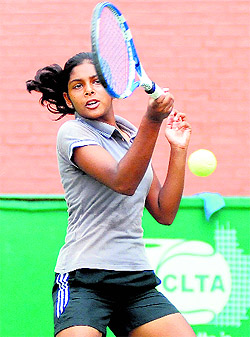 Shambhvi Tiwari returns a shot during a match of the St Stephens School AITA Championship Tennis Series at the CLTA tennis courts in Sector 10, Chandigarh.