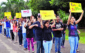 Members of an NGO, “Make a Difference”, take out a rally to mark World Literacy Day at Sukhna Lake in Chandigarh on Monday.