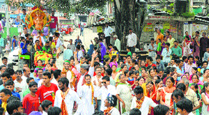A procession being taken out on the concluding day of Ganeshotsav in Mandi on Monday. 
