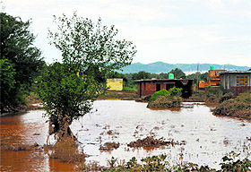 Beli Charana, inundated with Tawi floodwaters, awaits government attention.
