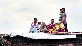 a family that escaped the flood fury returned to their homes to start their life afresh in Jammu on Monday. 