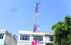 A mobile tower installed atop a commercial building in Ludhiana.