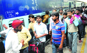 Survivours from the flood-hit J&K at the Chandigarh railway station on Monday.