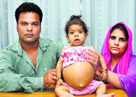 Samridhi with her parents in Jalandhar