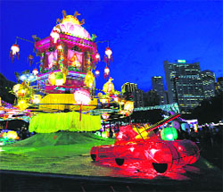 A lantern in the shape of a toy tank is displayed along with other lanterns during an event celebrating Lantern Festival at Hong Kong's Victoria Park on Monday.