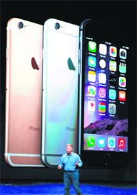Apple senior vice-president Phil Schiller talks about iPhone 6 at Flint Centre in Cupertino, California, on Tuesday.