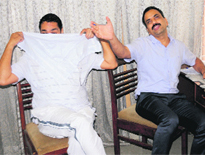The accused, head constable Paramjeet Singh (left), in CBI custody on Tuesday. 