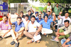 PUSU workers hold a protest outside the Vice-Chancellor's office at Panjab University on Tuesday.