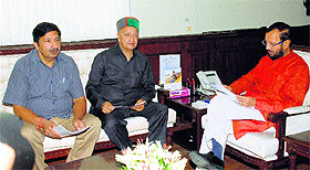 Chief Minister Virbhadra Singh at a meeting with Union Minister Prakash Javadekar in New Delhi on Tuesday. On his right is Industries Minister Mukesh Agnihotri.