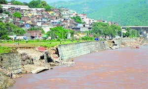 Tawi embankment damaged by the floods in Jammu