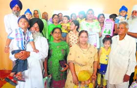 Children with their grandparents during a function at Babies Paradise Playway School in Ludhiana