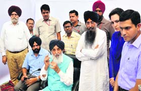 Chief Minister Parkash Singh Badal addresses a press conference at Chhapar