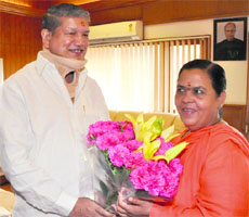 Chief Minister Harish Rawat meets Union Water Resources Minister Uma Bharati in New Delhi on Tuesday.