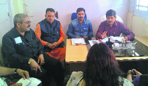 Members of the committee formed to discuss the freeze zone clause interact with Mussoorie residents on Tuesday.