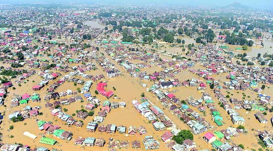 Kashmiri houseboats and houses submerged by floodwater are seen from an Indian Air Force helicopter during rescue and relief operations around Dal Lake in Srinagar on Wednesday. AFP