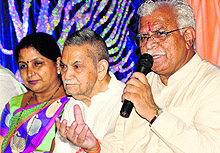 BJP candidate from Karnal Manohar Lal Khattar (extreme right), talks to the media in Karnal on Wednesday. Former minister ID Swami (centre) and Mayor Renu Bala Gupta looks on