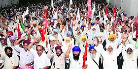 Various farmer organisations hold a joint convention to discuss their issue at Desh Bhagat Yadgar Hall in Jalandhar on Wednesday.