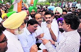 Congress councillors and residents of Maqsudan hold a protest in Jalandhar on Wednesday.