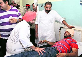 Youth Congress leader Paramjit Bal in hospital after he was attacked in Jalandhar on Wednesday. Tribune Photo: Sarabjit Singh
