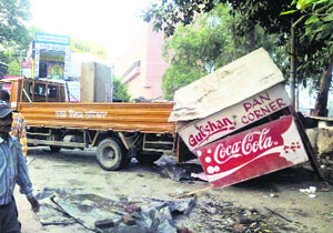 A khokha being removed from the Fountain chowk in Ludhiana on Wednesday.