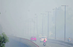 Smog engulfed the city in the early morning hours.